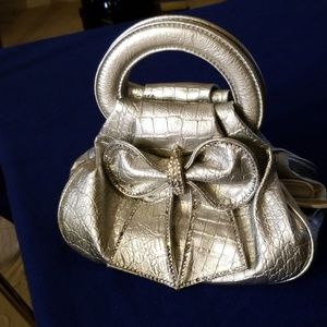 Silver purse with rhinestone bow NWOT